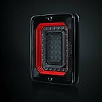 Strands FOR9T Illusion LED Rücklicht mit markantem roten Lichtdesign in rechteckiger Form, Produktfoto auf dunklem Hintergrund