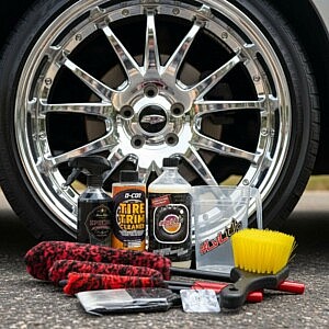Premium Reifenpflege Set mit Wheel Cleaner, Tire Cleaner, Tireshine und Dirty Business Bürsten vor glänzender Chromfelge